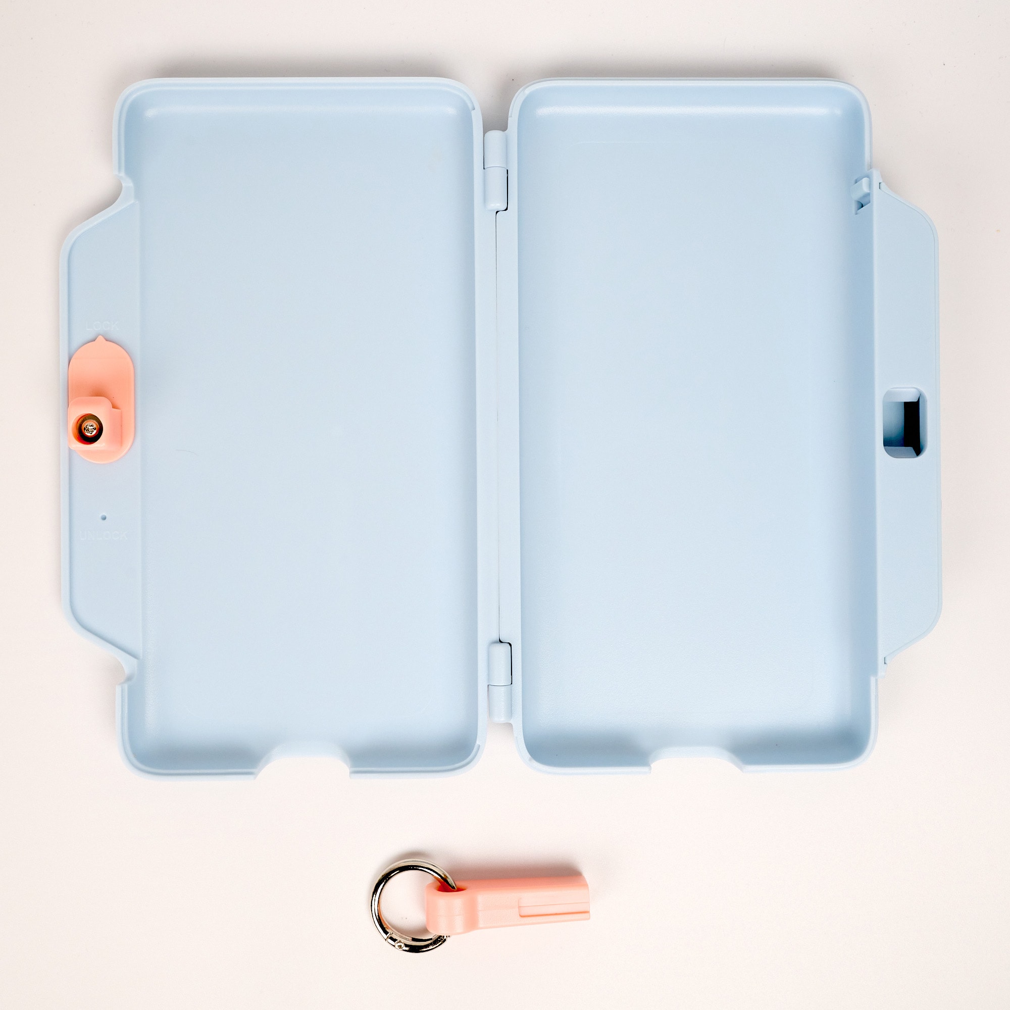Product image of Break mindless scrolling habits with an auto-locking smartphone case. Digi-tox Smartphone Lock Case with Key 3