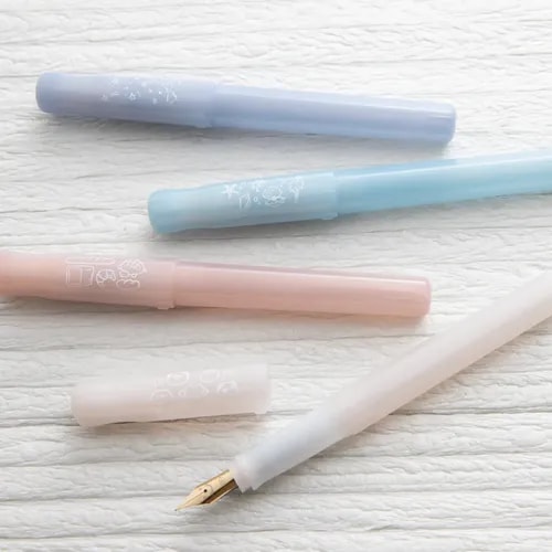 Nagasawa's Kakuno Madaromi Fountain Pen laid out on a table